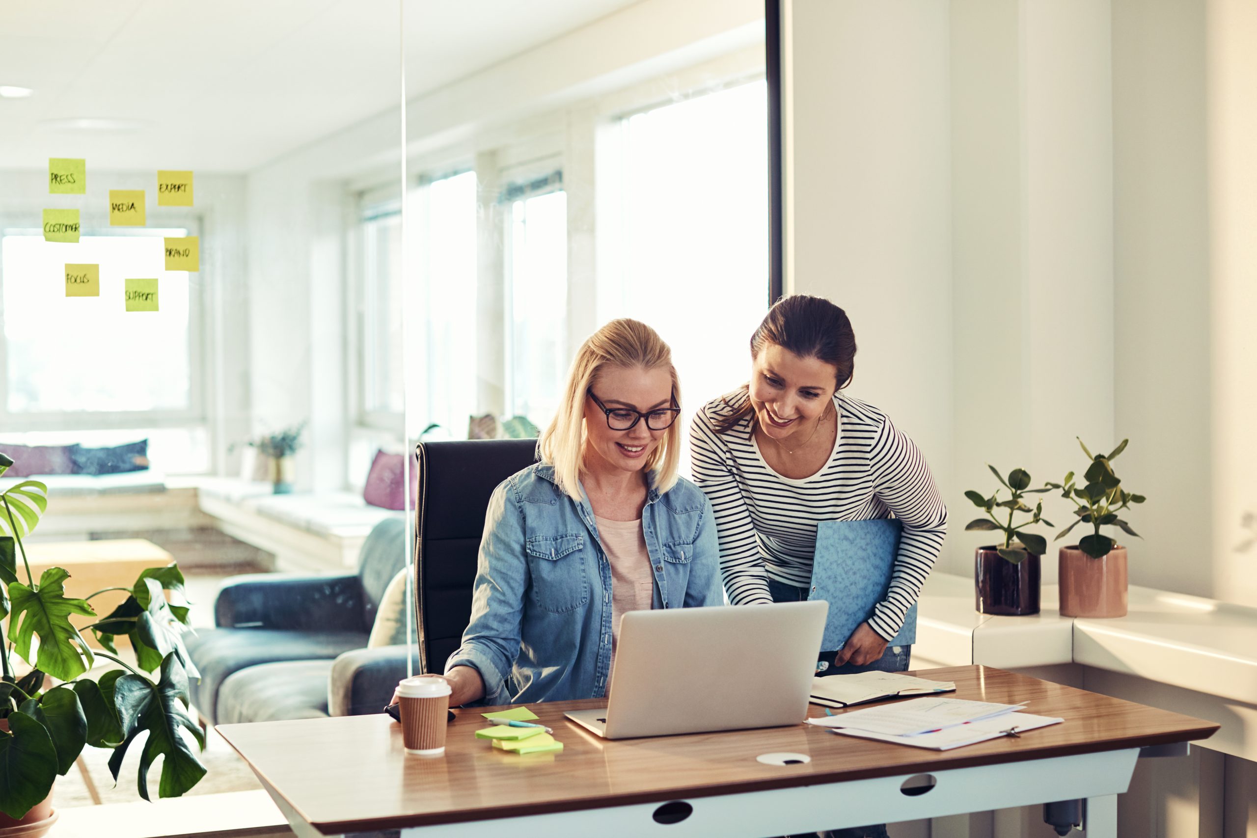 The marketing team collaborating around a table