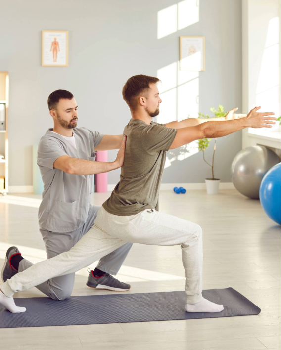 A physiotherapist guiding a patient through a rehab exercise